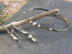 Iron and sterling silver.