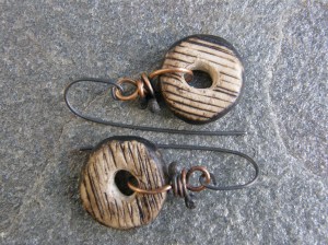 Ceramic beads, bronze wire, titanium hooks.
