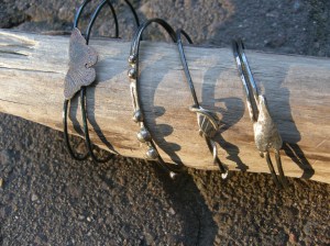 Iron wire, sterling silver, and an etched copper butterfly!