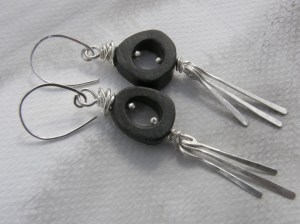 Stained and polished bone, sterling silver.